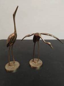 lot 107 image: Brass cranes