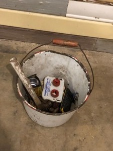 Bucket with miscellaneous items