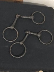 Cast iron shell and antique ring snaffle horse bit