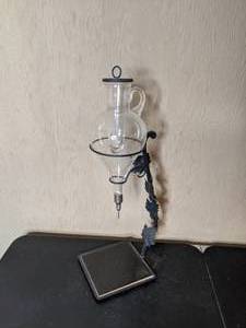 lot 43 image: Wrought Iron and Glass Beverage Dispenser