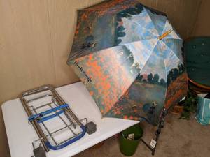 lot 80 image: Monet-Inspired Umbrella and Luggage Roller