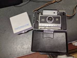 lot 220 image: Collectible Vintage Polaroid 360 Camera w Case & Portrait Kit