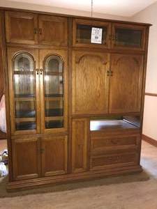 lot 10 image: Large Wood and Glass Entertainment Center