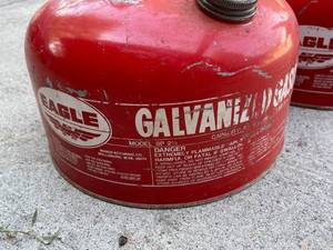 lot 75 image: 3 Vintage Metal Eagle Gas Cans