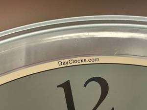 lot 130 image: Battery Operated Day Clock