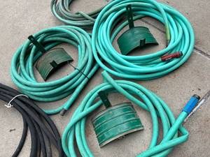 lot 165 image: Five Garden Hoses & Three Wall Mount Hose Reels