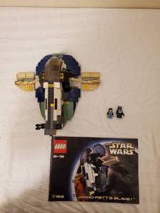 lot 12 image: Lego Star Wars Jango Fetts Slave 1 Set Number 7153