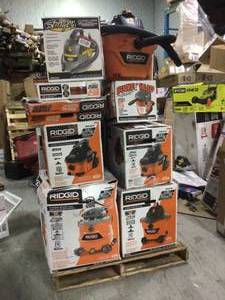 Pallet of assorted Ridgid Vacuums different sizes some may need repair or have missing pieces (see pictures)