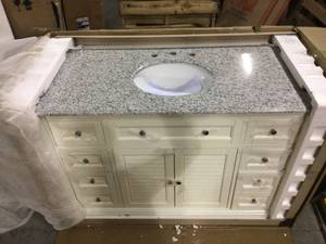 Hamilton Shutter 49-12 in. W x 22 in. D Bath Vanity in Ivory with Granite Vanity Top in Grey by Home Decorators Collection (see pictures)