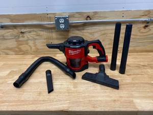 lot 65 image: MILWAUKEE M18 18V Lithium-Ion Cordless Compact Vacuum with 4 Hose, Extensions and HEPA Filter (Tool Only)