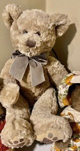 3 Teddy Bears and a Metal Chair