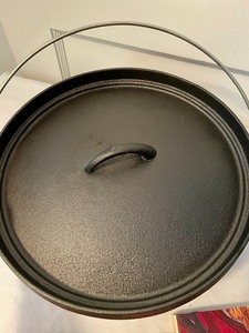 New Cast Iron Pot with 2 Books