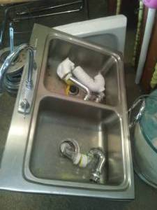 Stainless Steel Double Sink with Faucets (2) and more.
