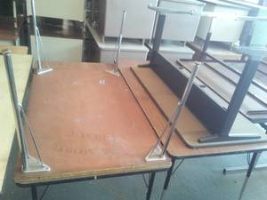 Tables with Laminate tops and adjustable legs (4).