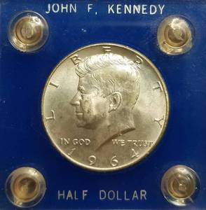 lot 29 image: 1964 KENNEDY HALF DOLLAR BU IN PLASTIC HOLDER
