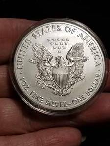 lot 13-A image: 2021 AMERICAN SILVER EAGLE 1 TROY OZ. .999 FINE SILVER IN AIRTITE
