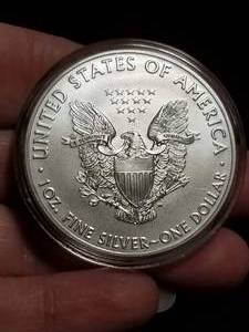 lot 39-A image: 2021 AMERICAN SILVER EAGLE 1 TROY OZ. .999 FINE SILVER IN AIRTITE