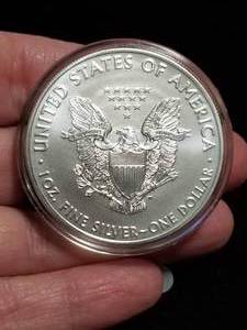 lot 51-A image: 2021 AMERICAN SILVER EAGLE 1 TROY OZ. .999 FINE SILVER IN AIRTITE