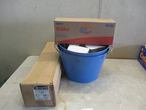 lot 3 image: Roll of Black Poly and 2 Steel Baskets with Hand Towels