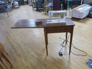 Singer Sewing Machine in Cabinet