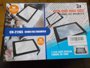 lot 384 image: 4 CD-21165 hands free magnifier...