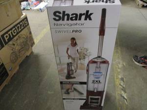 lot 1 image: Shark Navigator vacuum, missing acc...