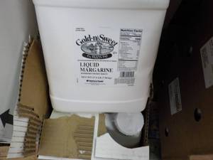 lot 438 image: 2 17.5 lb. jugs Gold-N-Sweet liquid...