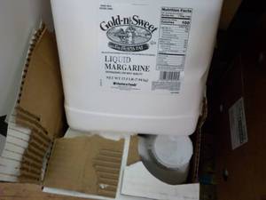 lot 439 image: 2 17.5 lb. jugs Gold-N-Sweet liquid...