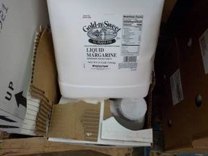 lot 440 image: 2 17.5 lb. jugs Gold-N-Sweet liquid...