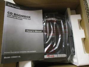 lot 29 image: Craig silver radio and CD boombox...