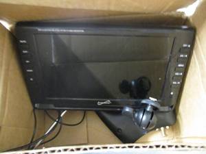 lot 31 image: Supersonic 9 portable black LCD TV...