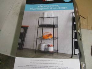 lot 183 image: Home Basics 4 tier wire shelving...