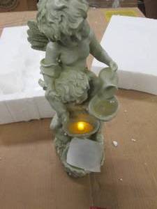 Solar Cherub lighted statuary, work...