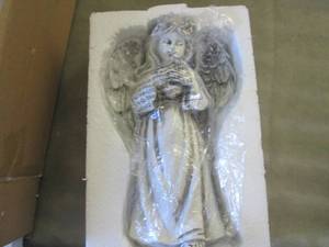 lot 82 image: Small Garden Angel damage in back...