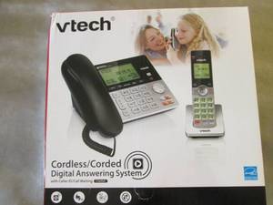 lot 75 image: Vtech CordedCordless Phone open bo...