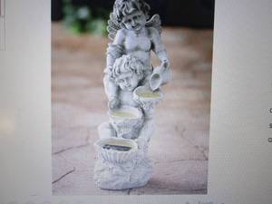 lot 169 image: Solar Cherub Lighted Statuary open ...