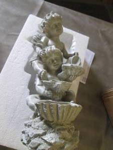 lot 329 image: Solar Cherub Lighted Statuary open ...