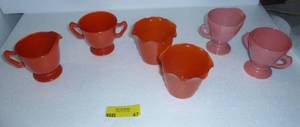 lot 47 image: Nice group of Hazel Atlas 50s orange and pink kitchenware