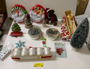 lot 88 image: Christmas Cookie or gift tins, stocking holder, candles, terry redlin lantern