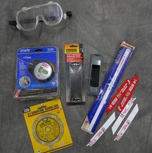 lot 120 image: New laser level, 4 Diamond sawblade, milwaukee sawzall blades, planer and safety glasses