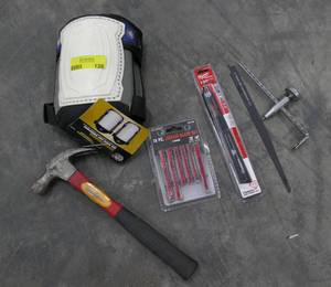 lot 128 image: New kneepads, jigsaw blades, sawzall blade, hammer