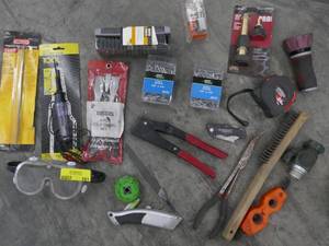 lot 161 image: Chisel set, steel rivets and riveter, voltage tester, wire brush, garden hose nozzle, utility knives, batter terminal cleaner, tape measure