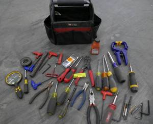 lot 164 image: Tool bag full of tools - screwdrivers snips, clamp etc