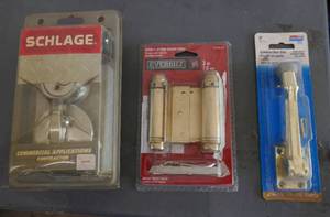 lot 186 image: Schlage commercial deadbolt, hinges and door stop