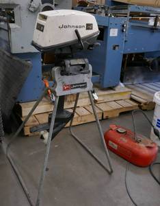 lot 195 image: 3hp Johnson boat motor and gas tank