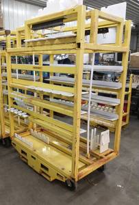 lot 217 image: Heavy steel storage cart 51 L x 73 Tall x 32 w with wheels, fork pockets and a tow bar and a brake