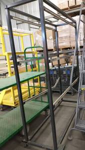 lot 222 image: Black frame storage unit 63 L x 79 Tall x 20 wide on wheels