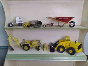 vintage toy trucks, including John ...