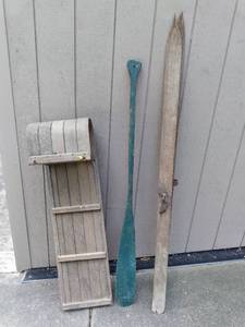 vintage toboggan, oar, and skins...