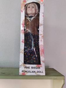 Fine Bisque porcelain doll in packa...
